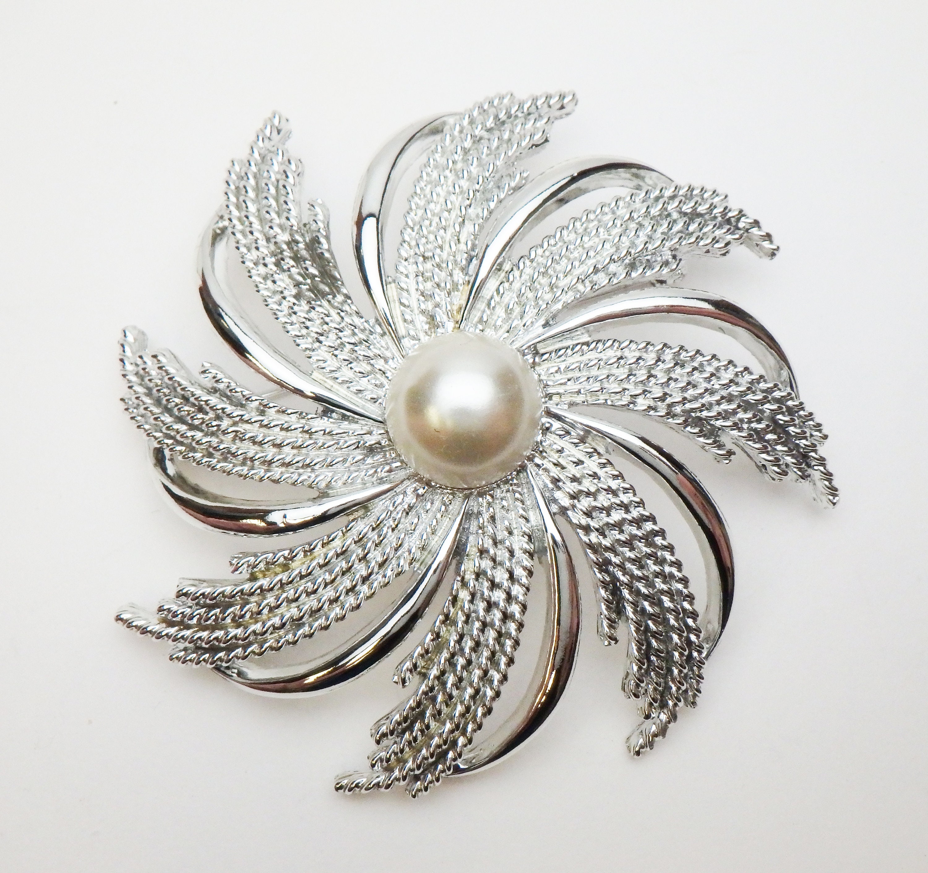 Vintage 1960s Sarah Coventry Silvery Starburst Brooch Silver Tone Metal Pinwheel with Faux Pearl Center