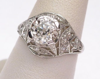 Platinum and 91 pt Old Miner's Cut Diamond with 20 ptw Sides Edwardian Engagement Ring