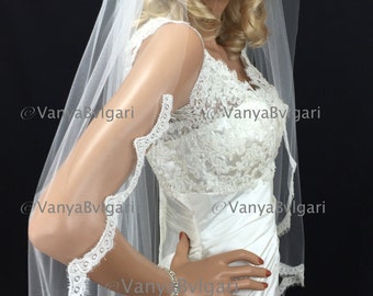 Bridal Alencon lace veil in fingertip length with lace starting at shoulder with gathered top wedding alencon lace veil in classic style