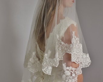 Lace veil in two layers fingertip with beaded wide lace and second tier could be used as a blusher, two tier lace veil with silver or gold