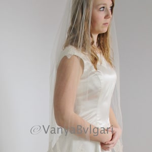 Lace veil fingertip square style with lace on the bottom edge only gathered on the top, single layer beaded Alencon lace style veil