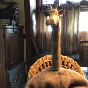 Carved folk art  giraffe  doll  wool clothes