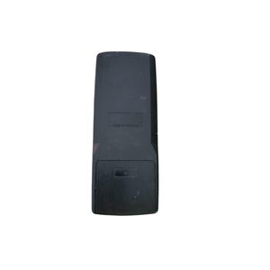 May include: A black rectangular remote control with a battery compartment at the bottom. The text "MADE IN MALAYSIA" is printed on the top portion of the remote. The remote has a slightly worn appearance.