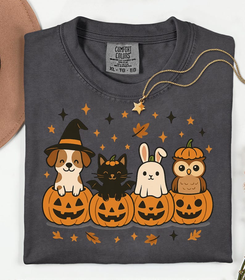 Cute Halloween PNG design with dog, cat, bunny, and owl inside pumpkins, cozy fall vibe