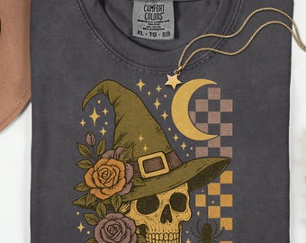 Camiseta com caveira de bruxa, camiseta vintage com chapéu de bruxa para Halloween, camiseta gótica com caveira e estrelas da lua, camiseta com rosas assustadoras de outono, blusa estética de bruxa