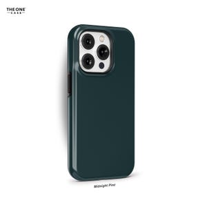 May include: A dark green phone case with a silver camera lens. The case is labeled "Midnight Pine".