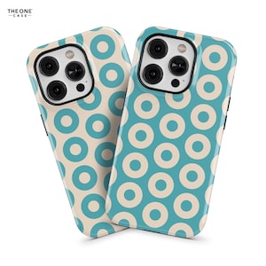 May include: Two phone cases with a pattern of blue and white circles. The cases are designed for an iPhone with a camera bump.