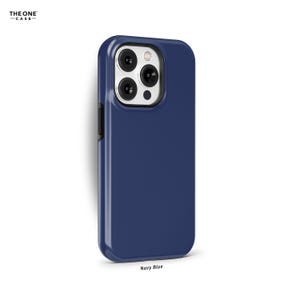 May include: A navy blue phone case for an iPhone with a silver camera bump.