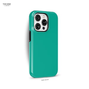 May include: A jade green phone case for an iPhone with a camera bump and a black border.