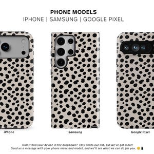 May include: Phone cases with a dalmatian spot pattern. The cases are shown for iPhone, Samsung, and Google Pixel models. The text "PHONE MODELS" and "THE ONE CASE" are visible. The cases have a cream background with black spots.