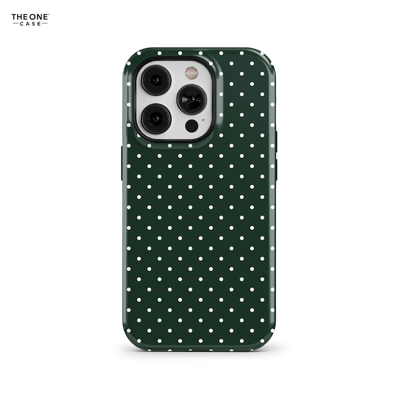 May include: A green phone case with white polka dots. The case has a raised camera bump with three lenses.