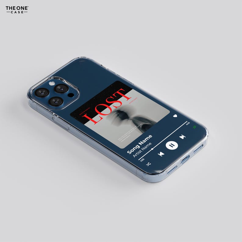 May include: A clear phone case with a blue background and a music player screen showing the song "LOST" by an artist. The screen shows the song title, artist name, and play controls.