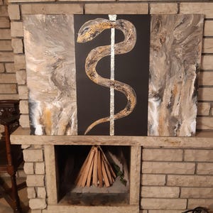 Beautiful, harmonious energy image of the Rod of Aesculapius, or the Staff of the Serpent. Unique techniques and expressive look with gold.