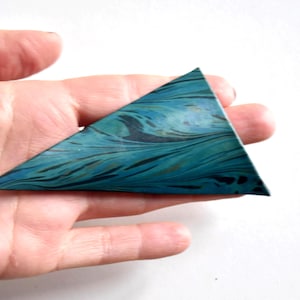 May include: A set of three ceramic vases in varying heights and shapes. The vases are glazed in a matte white finish, offering a minimalist aesthetic. The tallest vase is approximately 25 cm high.