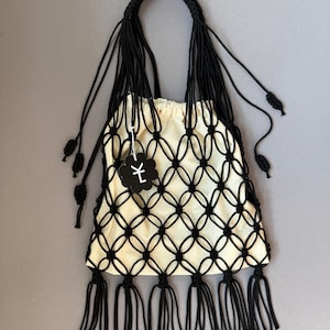 Handmade macrame net shoulder bag for women. Summer stylish mesh black for beach. Unique eco designer gift for her. Boho-style fringed bag.