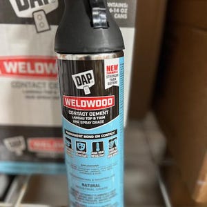 May include: A 14-ounce aerosol can of DAP Weldwood contact cement for Landau top and trim. The canister is light blue with black text and a black nozzle. It features labels for water resistance, high heat resistance, and industrial grade usage.