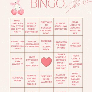 May include: A pink and brown Galentine's Bingo card with a pink heart in the centre. The card has 25 squares with different activities and phrases related to friendship, such as "Always texting their boyfriend", "Drinks multiple coffees to get through the day", and "Addicted to their phone".