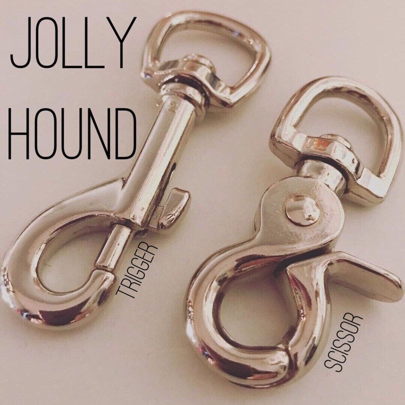 May include: Two silver metal trigger clips, one labeled "TRIGGER" and the other labeled "SCISSOR".