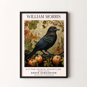 May include: A vintage poster advertising a William Morris Cotton Prints Exhibition at the South Kensington station in London. The poster features a black bird perched on a branch with autumn leaves and fruit. The text reads "William Morris Cotton Prints Exhibition, Nearest Station South Kensington, Mar. 12th to May. 10th Admission Free."