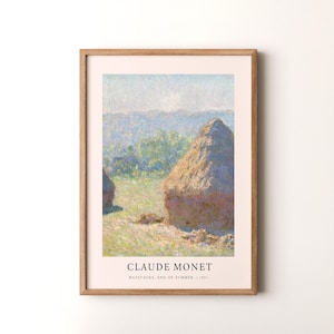 May include: A framed print of Claude Monet's Haystacks, End of Summer, 1891. The painting depicts a field of haystacks under a blue sky with white clouds. The haystacks are painted in a pointillist style, with small dots of color.