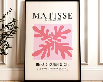 Op de afbeelding: Een zwart-witte poster met de titel "MATISSE" en de tekst "Papers Découpés (1953)". De poster heeft een roze achtergrond met een rood abstract ontwerp. De tekst "BERGGRUEN & CIE" staat onderaan de poster, samen met het adres "70, RUE DE L'UNIVERSITÉ, PARIS-VII" en de data "Du Vendred 27 Févr er au Samed 28 Mars 1953".