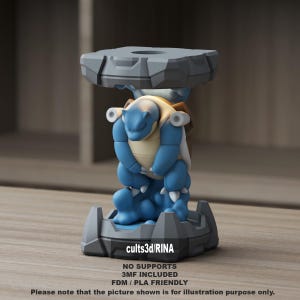 May include: A blue and beige figurine of a turtle-like creature, holding up a gray platform. The figurine is on a gray base. The text "cults3d/RINA" is visible on the base. Additional text includes "NO SUPPORTS", "3MF INCLUDED", and "FDM / PLA FRIENDLY".