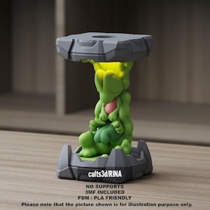 May include: A green and pink figurine with a gray base and top. The figurine has a unique design and is labeled "cults3d/RINA". The text "NO SUPPORTS", "3MF INCLUDED", and "FDM / PLA FRIENDLY" is also visible. The bottom text reads "Please note that the picture shown is for illustration purpose only."