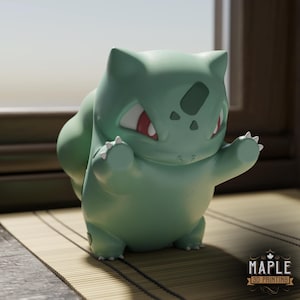May include: A light green Bulbasaur figurine with red eyes and white claws. The figurine is posed with its arms raised. The Maple 3D Printing logo is in the bottom right corner. The figurine is on a bamboo mat.