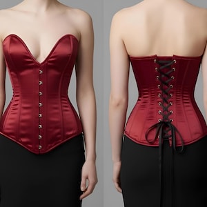 May include: A strapless, ruby red satin corset with a sweetheart neckline and a row of small, gold-colored buttons down the front. The back features a black lace-up closure. The corset is paired with a black skirt.