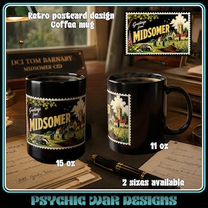 May include: Two black ceramic coffee mugs featuring a retro postcard design with the text Greetings from MIDSOMER. One mug is labeled 15 oz and the other 11 oz. The design depicts a church, a graveyard, and a badger in a colorful illustration.