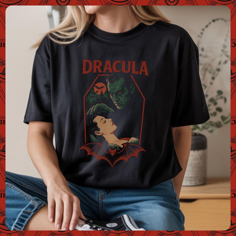 Woman wearing black shirt featuring Classic horror illustration of Dracula, coffin, bats, castle, bat