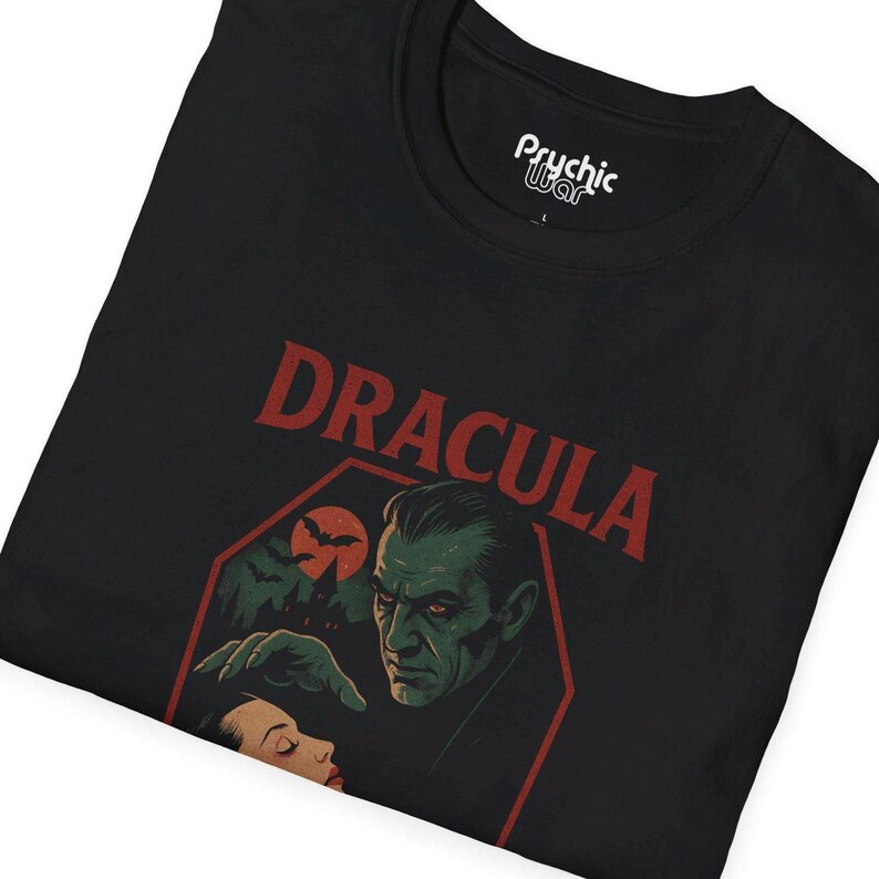 black shirt featuring Classic horror illustration of Dracula, coffin, bats, castle, bat