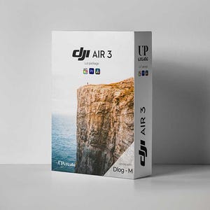 May include: A white box with a black and white image of a cliff overlooking a body of water. The box has the text "DJI AIR 3" and "UP create" on it.