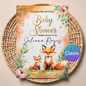 May include: A baby shower invitation featuring watercolor foxes and floral accents. The invitation includes the text "Baby Shower" in gold script, the name "Juliana Rayes", and event details. The design is set against a watercolor background with a woven basket.