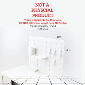 May include: A white 3D-printed pegboard, measuring 8cm x 6cm, with attached hooks and storage compartments. The text "NOT A PHYSCIAL PRODUCT" and other instructions are visible. This is a digital file for 3D printer.