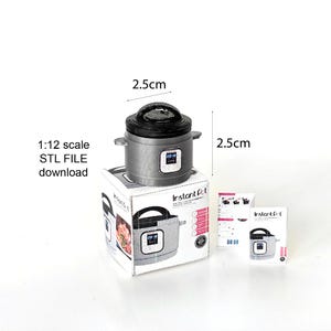 May include: A 1:12 scale model of a silver Instant Pot pressure cooker with a black lid. The model is 2.5 cm tall and 2.5 cm wide. The model comes with a box and instructions.