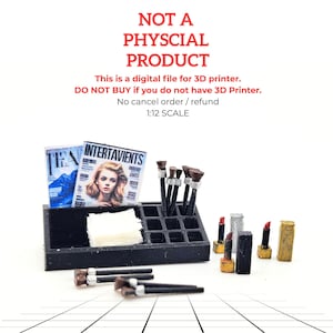 May include: Miniature makeup set with magazines, brushes, lipsticks, and a black organizer. The magazines read "TEA" and "INTERTAVIENTS". The text "NOT A PHYSCIAL PRODUCT" is visible. This is a digital file for a 3D printer.