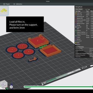 May include: A computer screen displays a 3D modeling software interface. The screen shows a 3D model of several red and orange components, with the text "Load all files in, Please turn on the support, and brim 3mm".