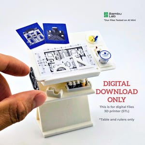 May include: A miniature white drafting table with architectural blueprints and a small yogurt container. The table has a shelf with tiny paint bottles. Text on the image reads "DIGITAL DOWNLOAD ONLY".