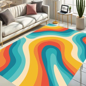 May include: A colorful area rug with a retro design. The rug features a wavy pattern in shades of orange, yellow, blue, and cream. The rug is placed on a white tiled floor, with a white sofa and pillows in the background.