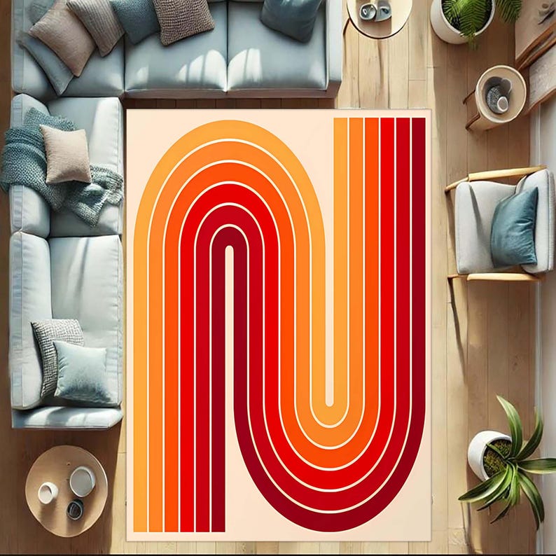 May include: A rectangular area rug with a retro design. The rug features a repeating pattern of curved lines in shades of red, orange, and yellow against a cream background. The rug is placed on a wooden floor, surrounded by furniture.