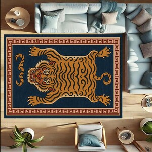 May include: A rectangular rug with a navy blue background and a stylized tiger design in shades of orange and black. The tiger is centered, with a detailed face and striped body. The rug has a decorative border in a reddish-brown color.
