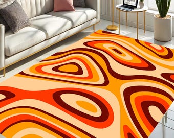 May include: Abstract area rug with a swirling pattern of orange, red, and brown on a cream background.