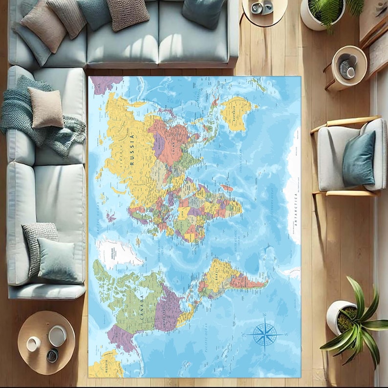 May include: A large rectangular rug featuring a world map design. The map is in shades of blue, green, yellow, and pink, with country names and a compass rose. The rug is placed on a wooden floor, surrounded by furniture.