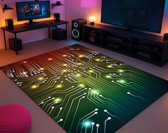 May include: A rectangular area rug with a circuit board design. The rug features a gradient of colors, transitioning from red to green, with white and yellow circuit lines. The rug is placed in a room with a gaming setup.