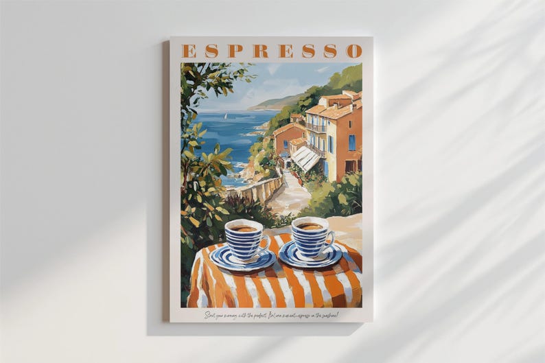 May include: A painting of a coastal town with two cups of espresso on a striped table. The text "ESPRESSO" is at the top of the painting. The text "Just your average day with the perfect brew for an amazing espresso in the beautiful" is at the bottom of the painting.
