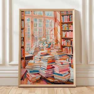 May include: A framed art print of a cozy library scene. Stacks of books in various colors are on a table and windowsill. A vase of flowers sits on top of the books. Bookshelves and a window are in the background.