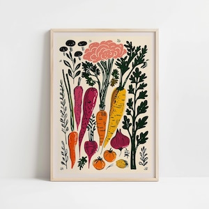 May include: A framed print featuring a colorful illustration of various vegetables. The artwork showcases carrots, beets, and other produce in shades of orange, purple, and yellow, with green foliage and a pink flower. The print has a light beige background.