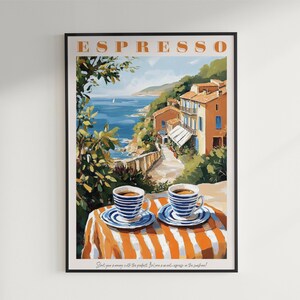 May include: A vintage-style poster with the word "ESPRESSO" in orange letters. The poster features a scenic view of a coastal town with colorful buildings and a blue ocean. Two cups of coffee with blue and white striped saucers are placed on a striped orange and white tablecloth. The text at the bottom of the poster reads "Still you crave a summer with the perfect Italian espresso, a cool breeze and orange groves in the orchard."