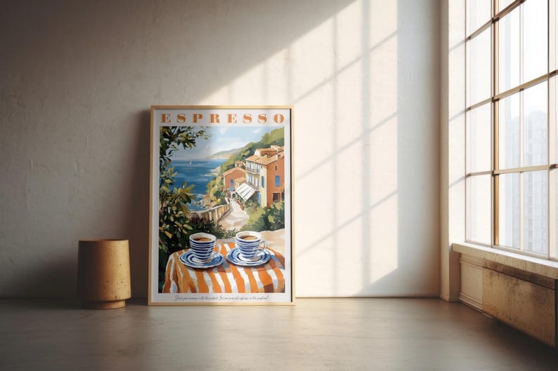 May include: A vintage-style poster with the word "ESPRESSO" in bold orange letters. The poster features a colorful illustration of a seaside town with two cups of coffee on a striped tablecloth.
